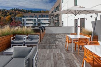 Outdoor terrace with view of the willamette river and mt. Hood